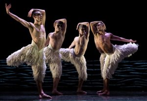 Edd Mitton and other dancers perform as swans in Matthew Bourne's Swan Lake